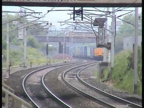 37610 and 37602 passing Carnforth whilst working the 4M44 on 20th June 2013