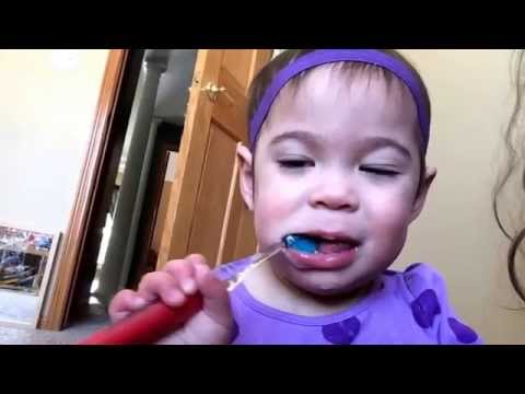 Madeline loves brushing her teeth