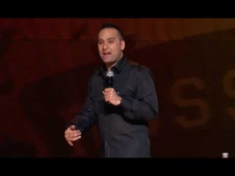 Russell Peters Indian men holding hands