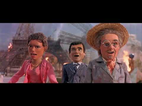 Trailer montage frame with marionette jets streaking over a miniature cityscape