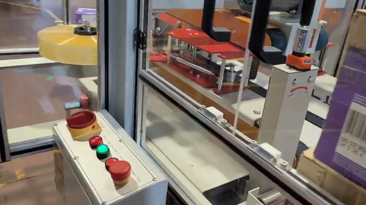 Case Sealing Machine Fitted with Protective Covers by TADBIK