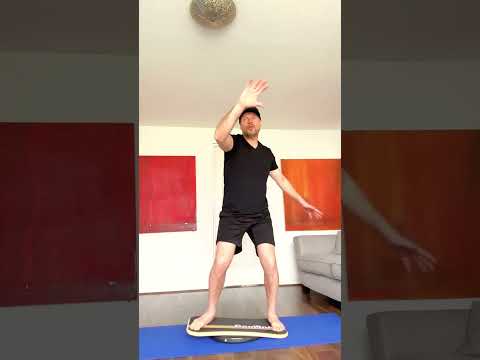 Surf turn exercise drill dry land surfers training technique on CoolBoard balance board core trainer
