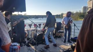 Alex Cameron on a boat in Austin