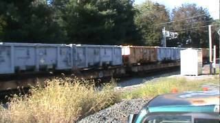 preview picture of video 'csx local at adamstown md w road slug 2265 and 6482 gp40 strange chemical cargo'