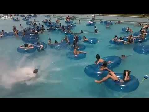 Lifeguard quickly spots and then saves drowning kid at public pool