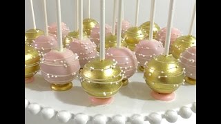 Upside down pink & gold Cakepops with flat bottom base and stripes/swirls design