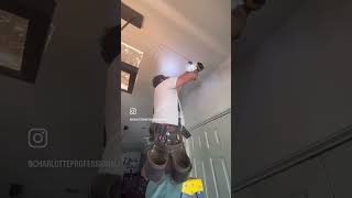Investigating a water stain on the ceiling