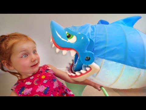 DON'T GET CAUGHT!! Adley reviews Shark Bite pool toy with Mom (mystery guest) Video