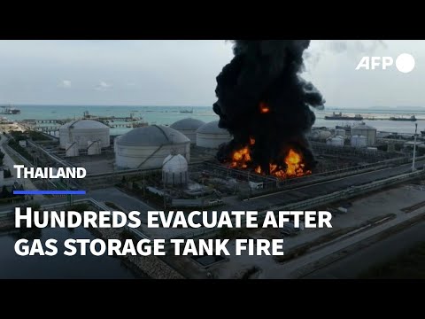 Hundreds evacuate after Thai gas storage tank fire | AFP