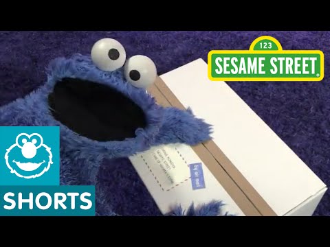 Sesame Street: Cookie Monster Unboxing a Package from the UK