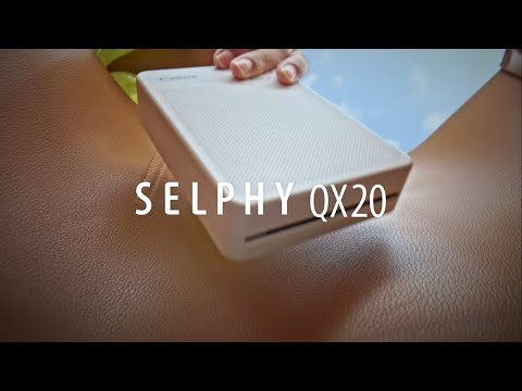 طابعة كانون سيلفي QX20 RD المدمجة – طباعة مباشرة عبر Wi-Fi، صور 2.8×3.3 بوصة بتقنية Dye-Sublimation باللون الأحمر video