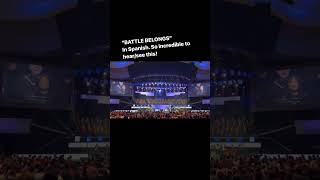 “BATTLE BELONGS” being led at a Spanish church service.