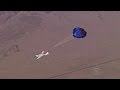 Powerless plane makes parachute landing