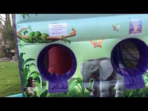 Inflating Our Fun Run/Assault Course 9X28 Jungle Themed Bouncy Castle