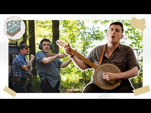 Sam Shackleton playin banjo and shootin at Benjamin Tod's place.