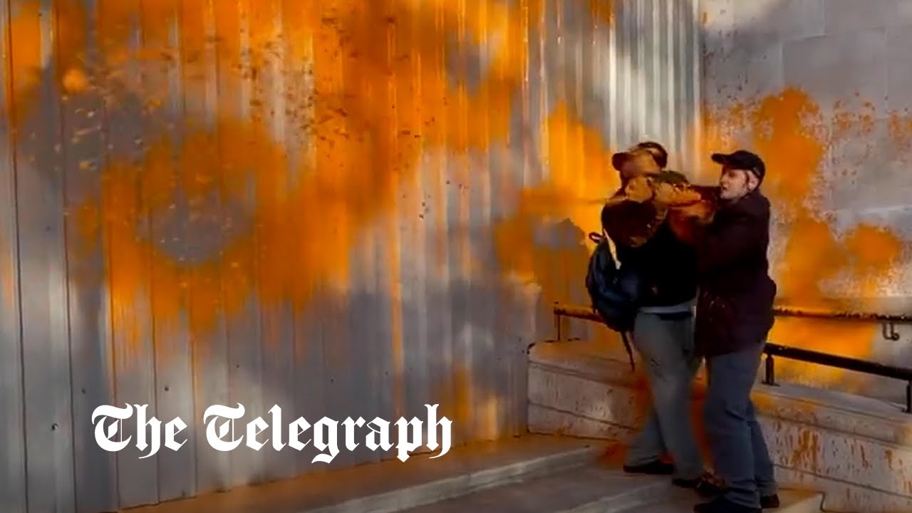 Watch Passerby wrestles Just Stop Oil protester during latest paint stunt