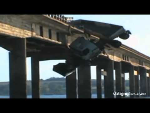 Driver saved from truck on bridge edge