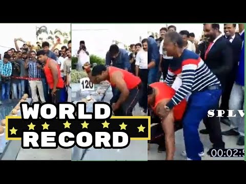 World Record : Indian man Smashes 124 Coconuts in 1 Minute with his bare hands