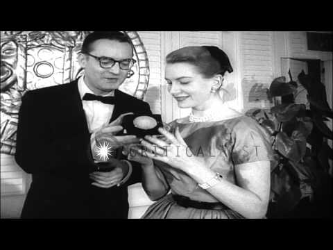 Deborah Kerr and Rock Hudson win the Photoplay Magazine's Gold Medal Awards. HD Stock Footage