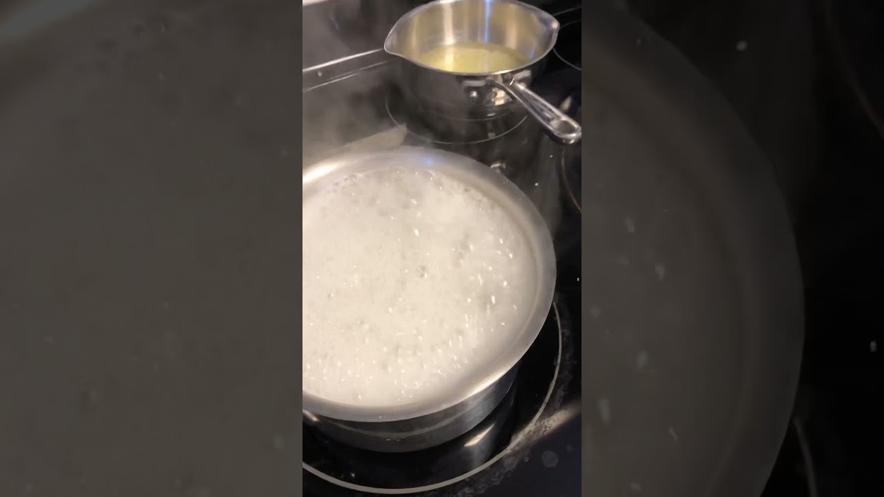 How to keep boiling water from overflowing out of the pot