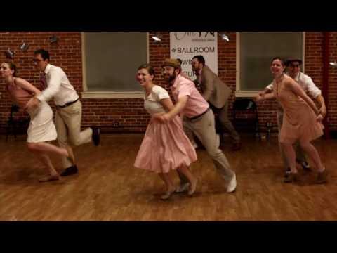 The Boston Lindy Hop Instructors performing a choreography by Katie Piselli