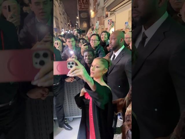 Ariana Grande showing all the love to fans at the Paris screening