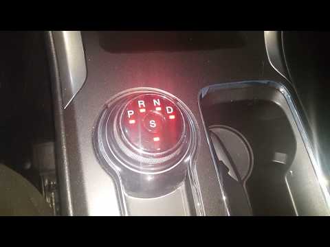 2017 ford fusion shift lock release