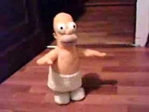 Homer Simpson cantando "Macho man"