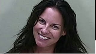 Woman who smiled in mugshot sentenced in DUI crash
