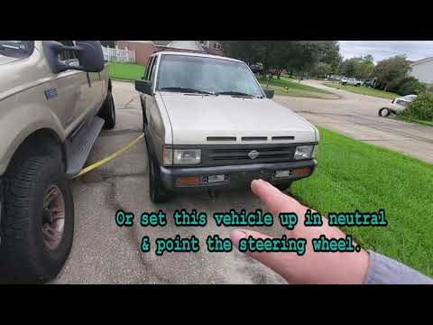 Part of a video titled How to move a dead car in a driveway by yourself or Parallel Pull a car