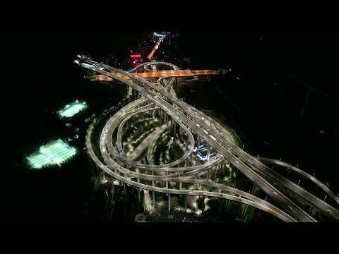 GLOBALink | Aerial night view of roller coaster-like interchange in SW China GLOBALink | Aerial night view of roller coaster-like interchange in SW China