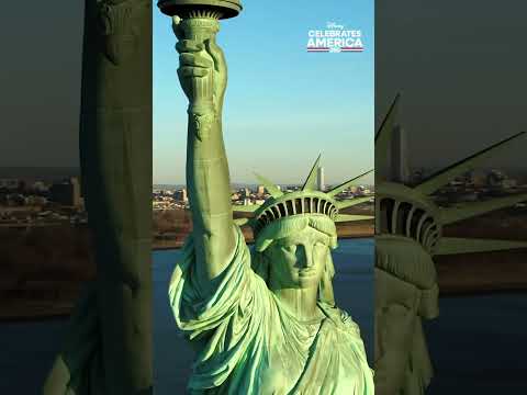 David Muir climbs up to the Statue of Liberty's torch