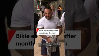 Bikie extradited after months on the run