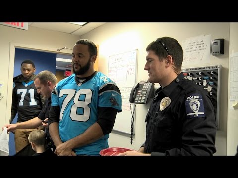 Panthers Surprise Police Officers and Firefighters with Pizza Delivery
