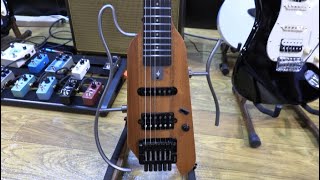 Video thumbnail for Donner’s upgraded travel-friendly guitar, the HUSH-X headless electric at NAMM 2023 by Guitar World