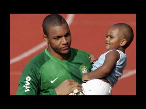Nelson Dida and his wife and children