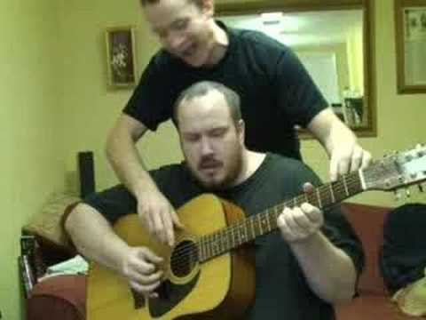 Re: Four Hands Guitar