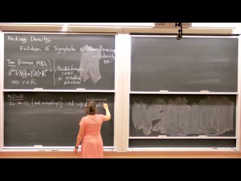 Symplectic embeddings and infinite staircases in toric 4-manifolds