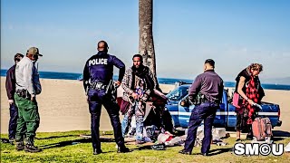 𝗧𝗘𝗡𝗦𝗘 𝗦𝗧𝗔𝗡𝗗𝗢𝗙𝗙: Police Confront Homeless Man Who Refuses to Leave During Venice Cleanup