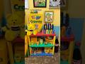 Decorating a crayon box-themed shelf! #dandelioncrayon #nostalgia