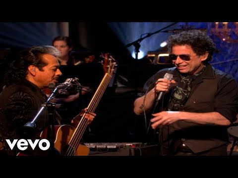 La mesa del rincon Ft. Andres Calamaro - Los Tigres Del Norte