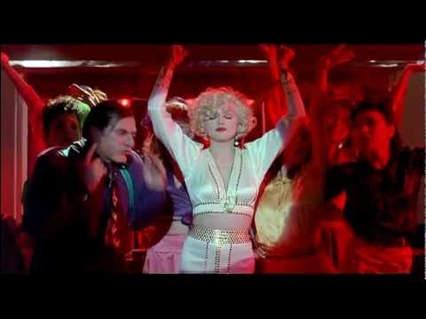 Al Pacino teaches Madonna how to sing.