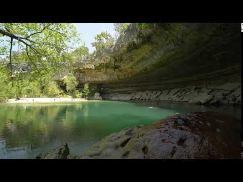 hidden beach under rock formations