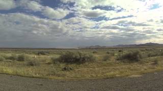 preview picture of video 'Following the Southern Pacific Railroad Tracks into Maricopa, Arizona, AZ SR 238, GP048754'
