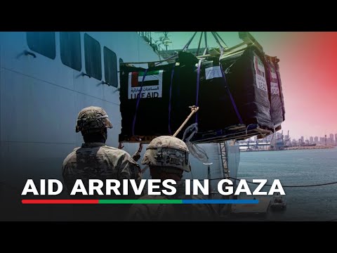 Gazans rush to shores as aid begins to arrive in Gaza via US-built pier