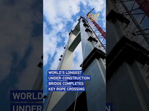 World's longest under-construction bridge completes key rope crossing#coolchina