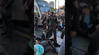 Israeli police Struggle to disperse Haredi demonstrators blocking traffic in Jerusalem