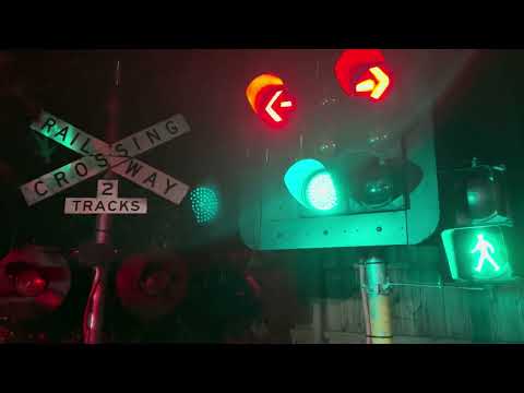 Traffic light & Rail light working at night in the rain 4K