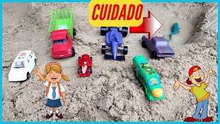 playing with carts in the sand! truck, bus, formula1 car, toy alligator on the track