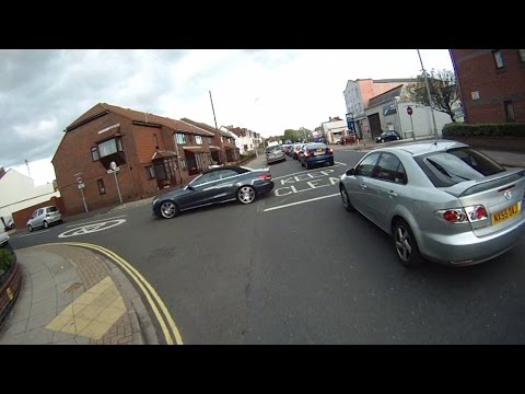 Driver Anticipates Cyclist Filtering